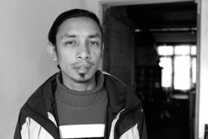 Jupiter Pradhan, artist photographic portrait, Nepal album